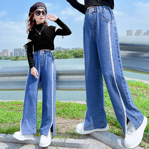 Mėlynos spalvos vaikiški laisvalaikio džinsai su skeltukais