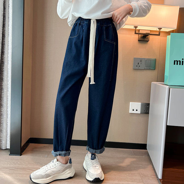 Mergaičių džinsai plačiomis kojomis su raišteliais ir kišene