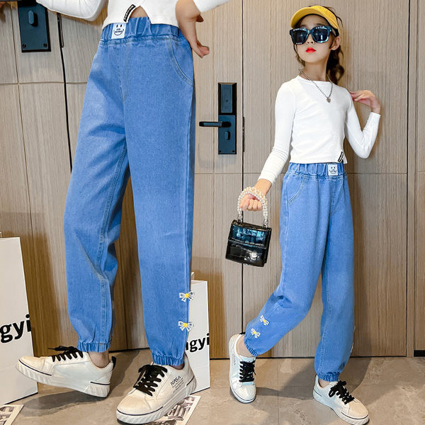 Dječje traperice s visokim strukom i džepom