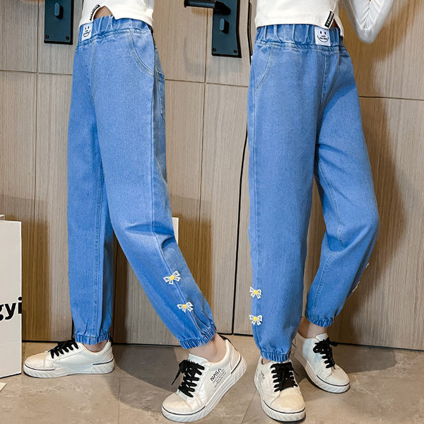 Dječje traperice s visokim strukom i džepom