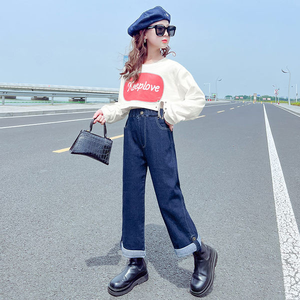 Magas derekú, rugalmas lány farmernadrág