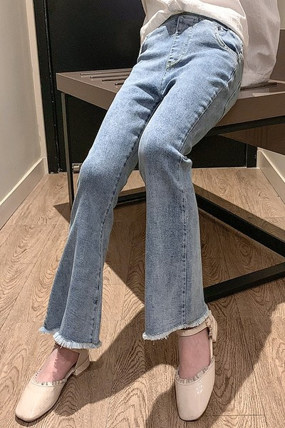 Madingi vaikiški džinsai su plėšytais motyvais mergaitėms