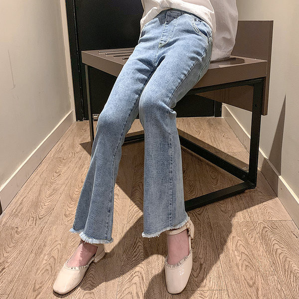 Madingi vaikiški džinsai su plėšytais motyvais mergaitėms