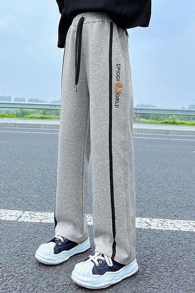 Vaikiškos sportinės kelnės mergaitėms su apvadu ir užrašu