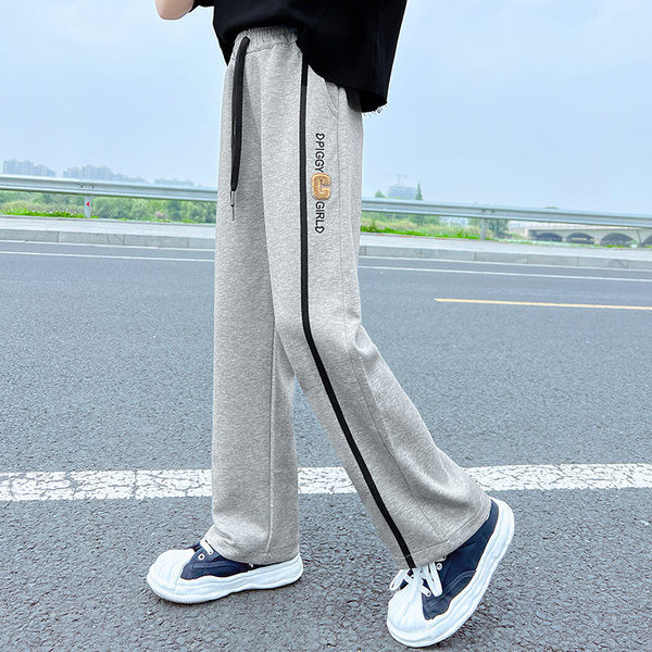 Vaikiškos sportinės kelnės mergaitėms su apvadu ir užrašu