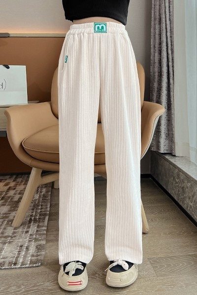 Dviejų spalvų vaikiškos kelnės su kišene