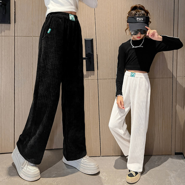 Dviejų spalvų vaikiškos kelnės su kišene