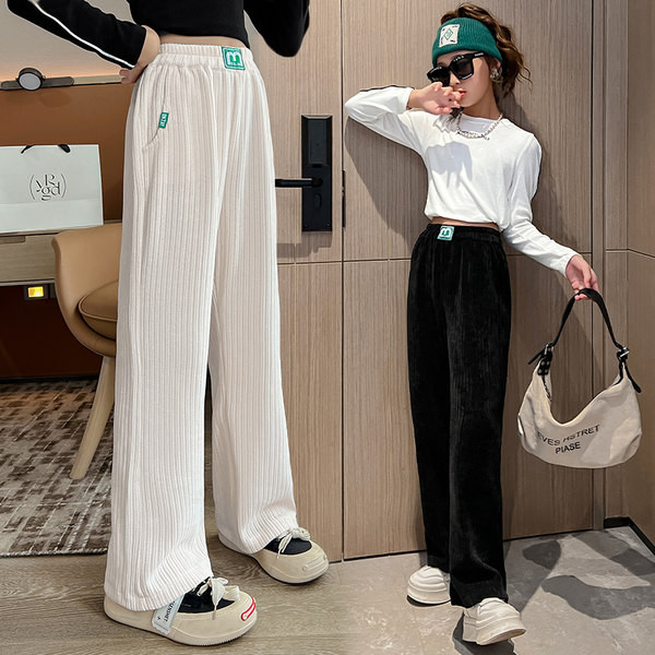 Dviejų spalvų vaikiškos kelnės su kišene