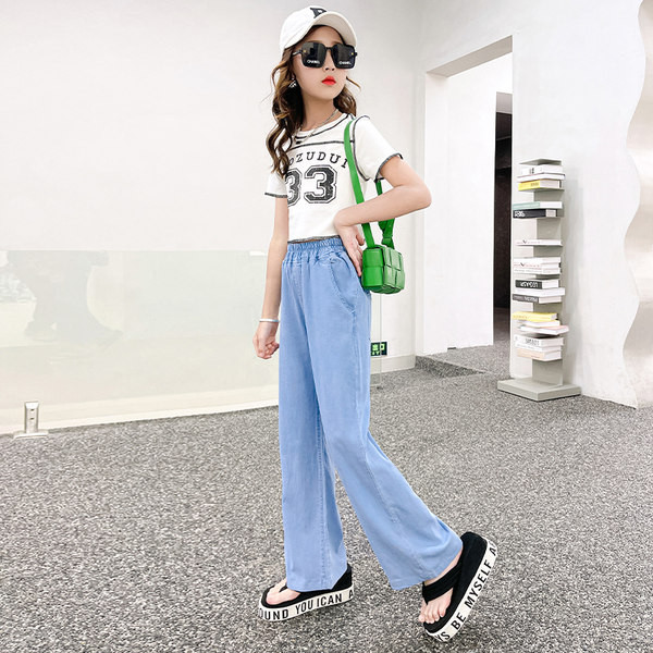 Vaikiški džinsai su kišenėmis ir raštu