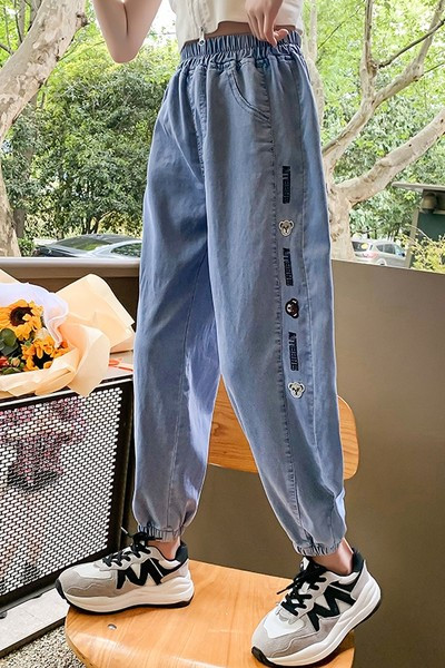 Elasztikus nyomott farmernadrág lányoknak