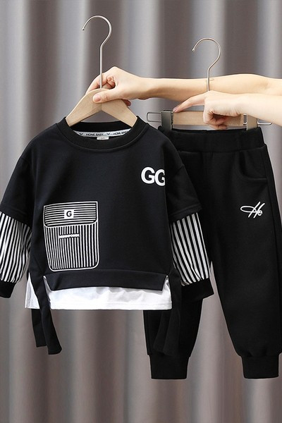 Set copii pentru viata de zi cu zi, format din doua bucati de pantaloni si o bluza