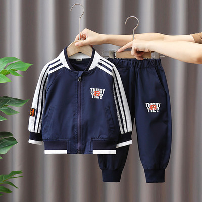 Dvodijelni sportski set s patentnim zatvaračem i džepom za dječake