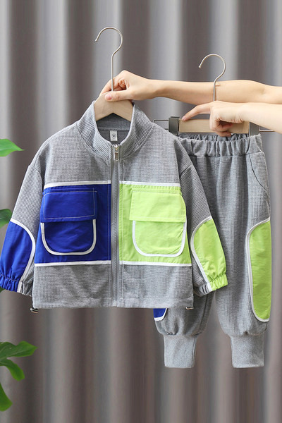 Novi model dječjeg kompleta sa džepom i patentnim zatvaračem