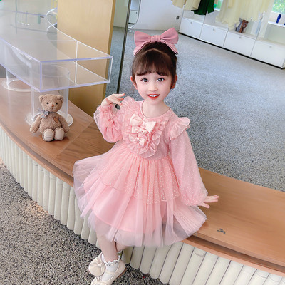 Dječja moderna haljina s dugim rukavima i trakom