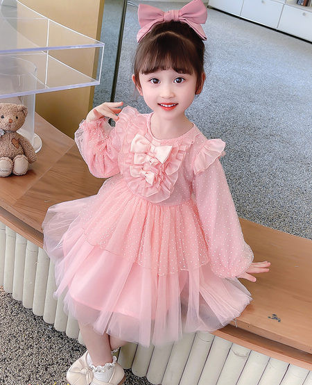 Dječja moderna haljina s dugim rukavima i trakom