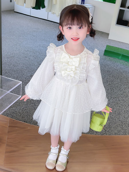 Dječja moderna haljina s dugim rukavima i trakom