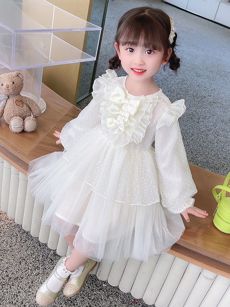 Dječja moderna haljina s dugim rukavima i trakom