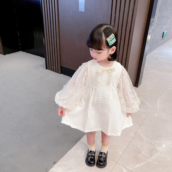 Elegantiška vaikiška suknelė su siuvinėjimu ir kaspinu