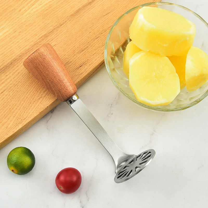 Rozsdamentes acél préselt burgonyanyomó fa nyelű gyümölcslé készítő Lila burgonya sütőtök sárnyomó konyhai kütyük