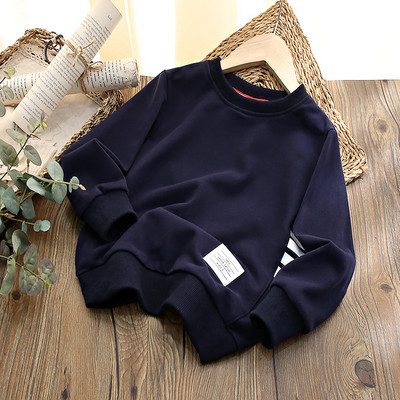 Laisvo kirpimo megztinis berniukams O formos iškirpte ir logotipu