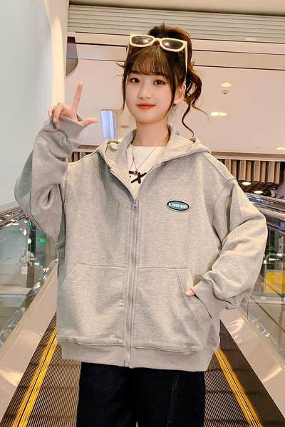 Trenirka s logotipom i patentnim zatvaračem za djevojčice