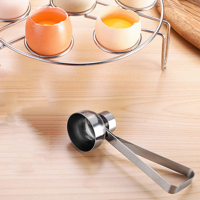 Uued metallist munakäärid munade pealislõikuri kest roostevabast terasest avaja keedetud toores muna avatud loominguline köögitööriistade komplekt