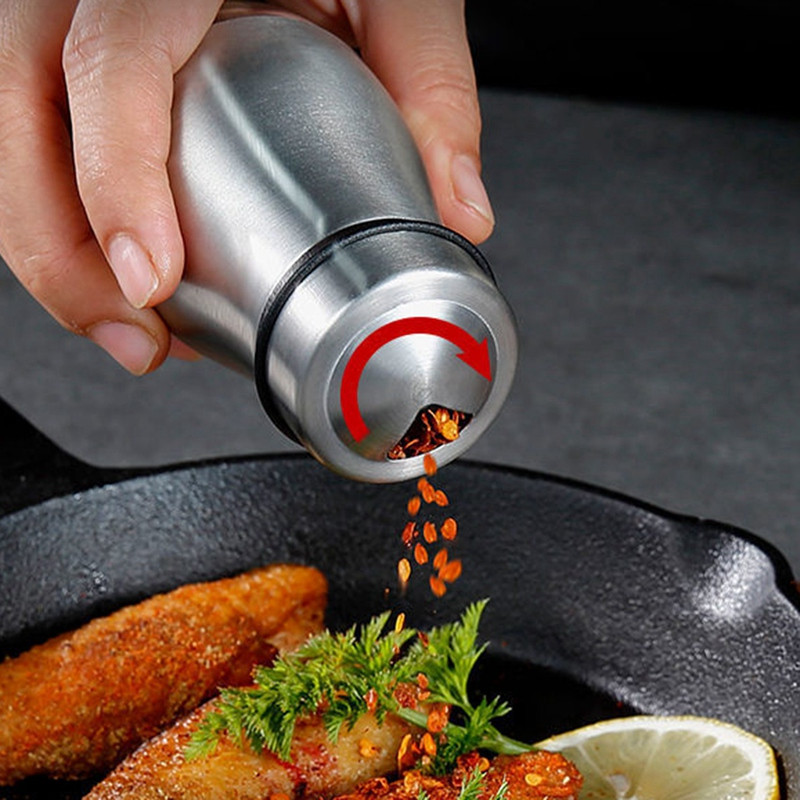 Set lonaca za sol i papar Solanka od nehrđajućeg čelika sa staklenim postoljem s podesivim otvorom za izlijevanje