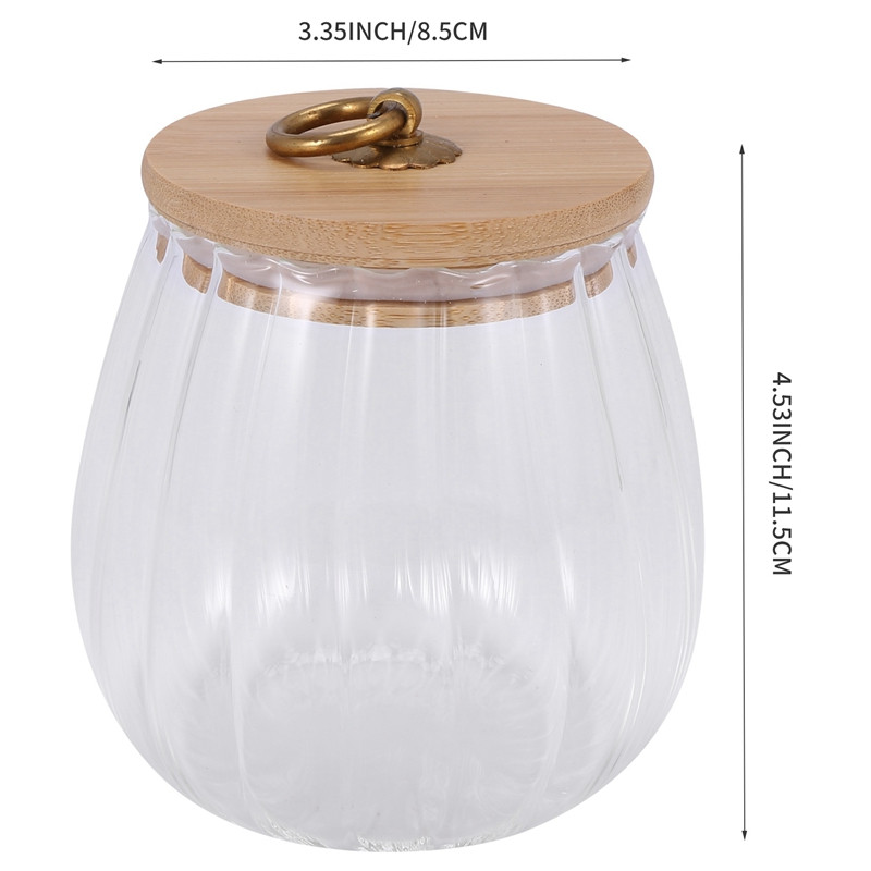 Uždarytas skaidrus stiklinis prieskonių puodas su dangčiu, arbatos laikymo indelis, druskos pipirų laikymo dėžutė, cukraus dubens virtuvės priedai