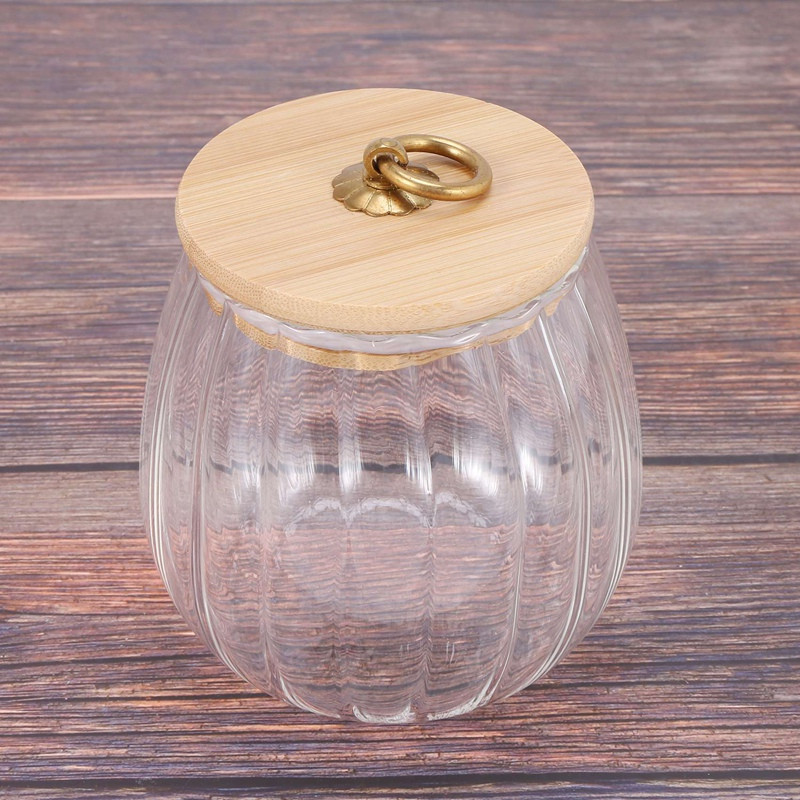 Uždarytas skaidrus stiklinis prieskonių puodas su dangčiu, arbatos laikymo indelis, druskos pipirų laikymo dėžutė, cukraus dubens virtuvės priedai