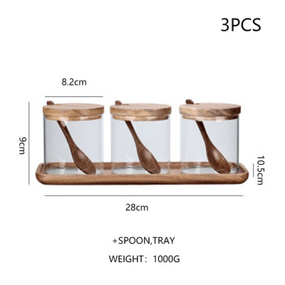 Staklena posuda za začine s drvenim poklopcem. Staklo za pohranu hrane. Prozirni spremnici. Kuhinjski šank. Zatvoreni spremnik. Sol. Šećer. Rezerva začina. Alati