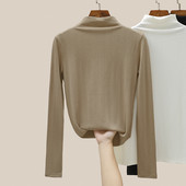 Ženska bluza s visokim ovratnikom i printom