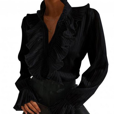 Elegantna ženska jesenska bluza dugih lepršavih rukava i dugmadi s volanima, gornji dio uredske košulje