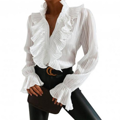 Elegantna ženska jesenska bluza dugih lepršavih rukava i dugmadi s volanima, gornji dio uredske košulje