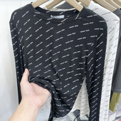 Laisva moteriška palaidinė su raštu