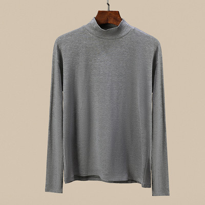 Švaraus modelio moteriška palaidinė ilgomis rankovėmis ir aukšta apykakle