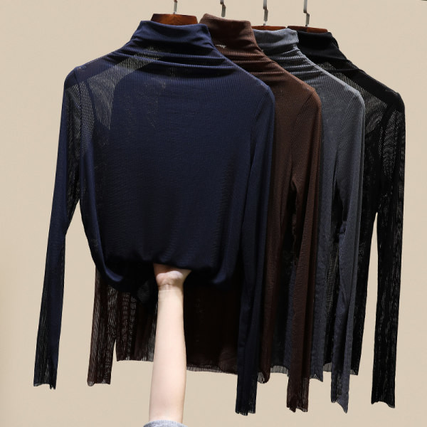 Moderna ženska bluza s visokom polo kragnom