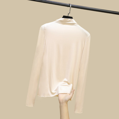 Moteriškos palaidinės švarus modelis su aukšta apykakle