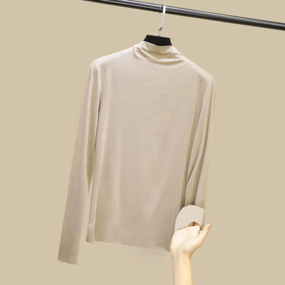 Moteriškos palaidinės švarus modelis su aukšta apykakle