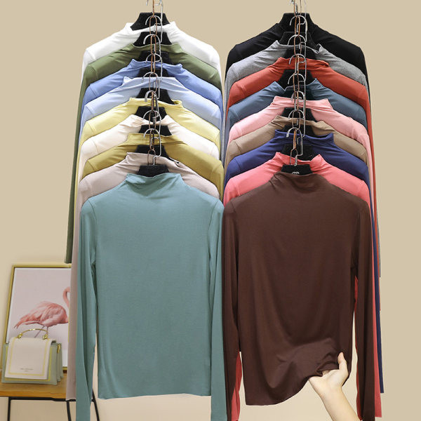 Moteriškos palaidinės švarus modelis su aukšta apykakle