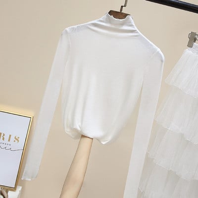 Női egyszínű blúz magas pólógallérral