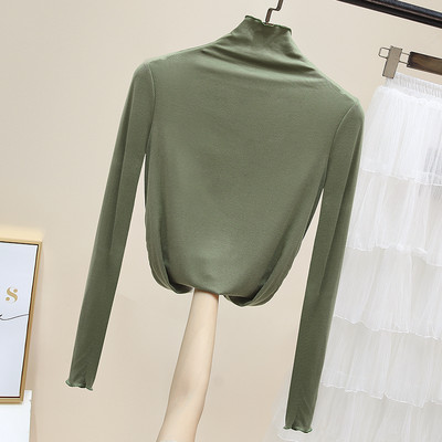 Női egyszínű blúz magas pólógallérral