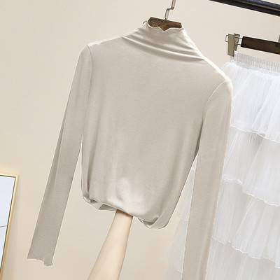 Női egyszínű blúz magas pólógallérral