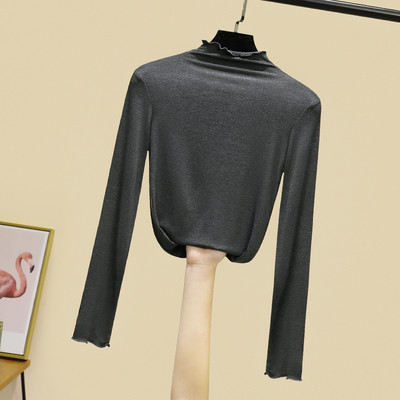 Női egyszínű blúz magas pólógallérral