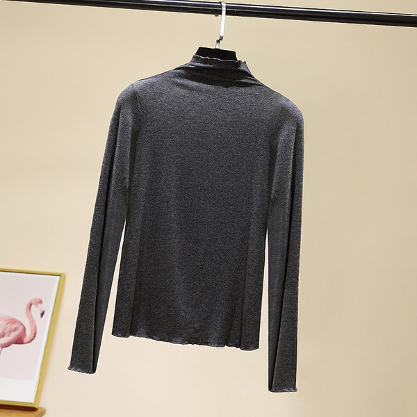 Női egyszínű blúz magas pólógallérral