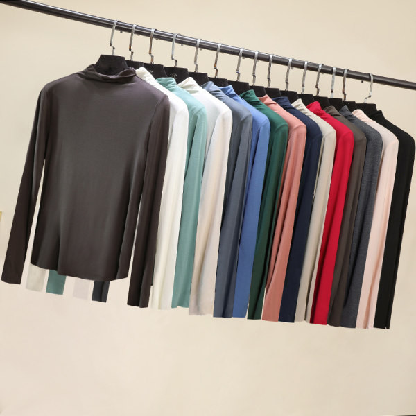 Švarus moteriškos palaidinės su aukšta apykakle modelis