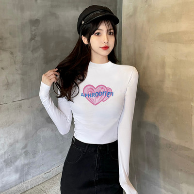 Laisva moteriška palaidinė su kelių spalvų raštu