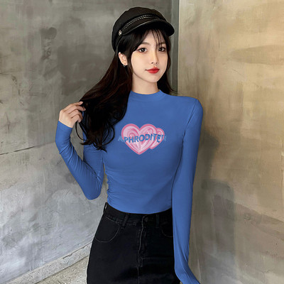 Laisva moteriška palaidinė su kelių spalvų raštu