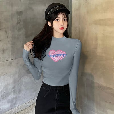 Laisva moteriška palaidinė su kelių spalvų raštu