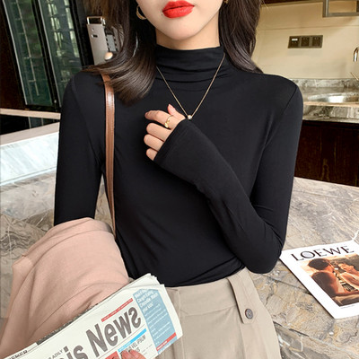 Ühevärviline pikkade varrukate ja polokraega naiste pluus