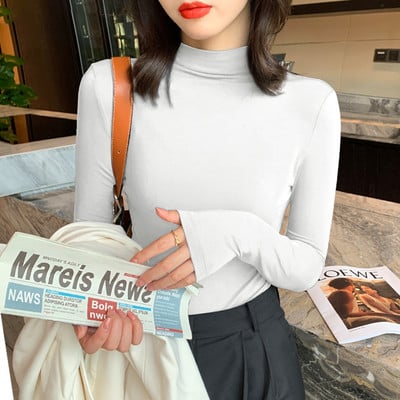 Ühevärviline pikkade varrukate ja polokraega naiste pluus